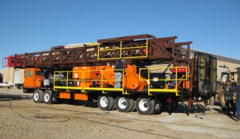Service King Manufacturing SK 475 Carrier mount rig with 96 foot workover derrick.
